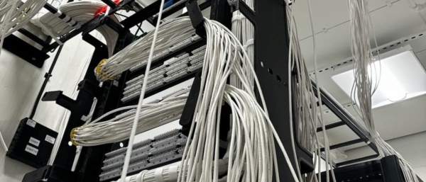 Structured cabling contractor Dallas managing organized Cat6 cable pathways for law firm infrastructure project