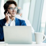 Construction company owner using mobile cloud phone system while managing projects in Dallas-Fort Worth