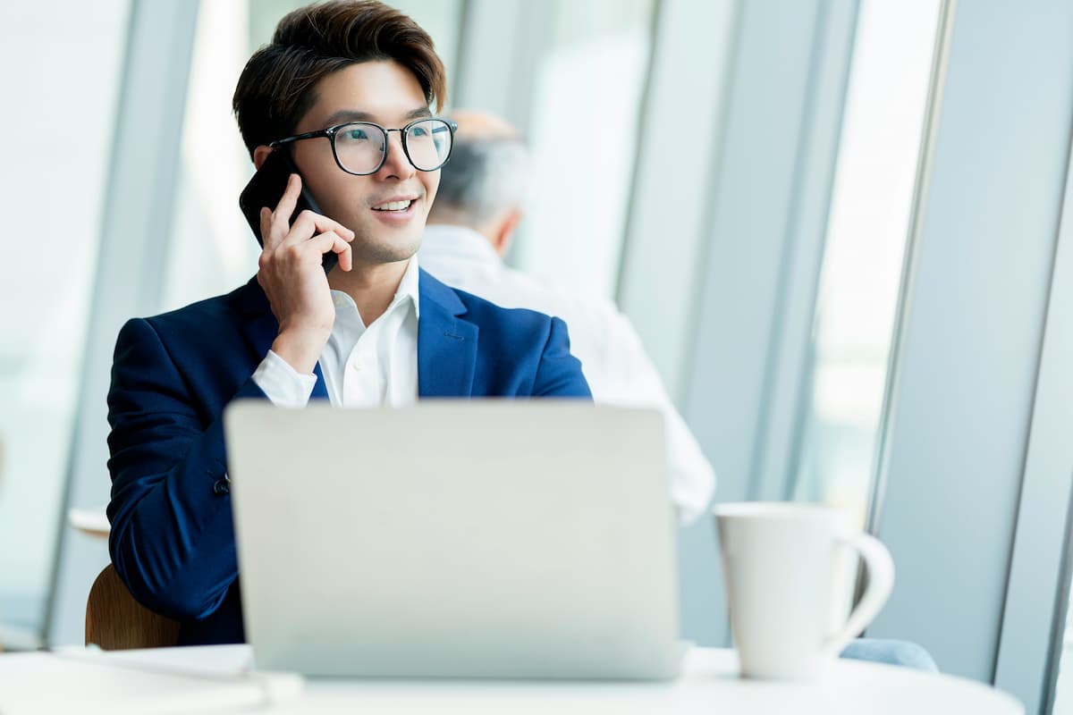 Construction company owner using mobile cloud phone system while managing projects in Dallas-Fort Worth