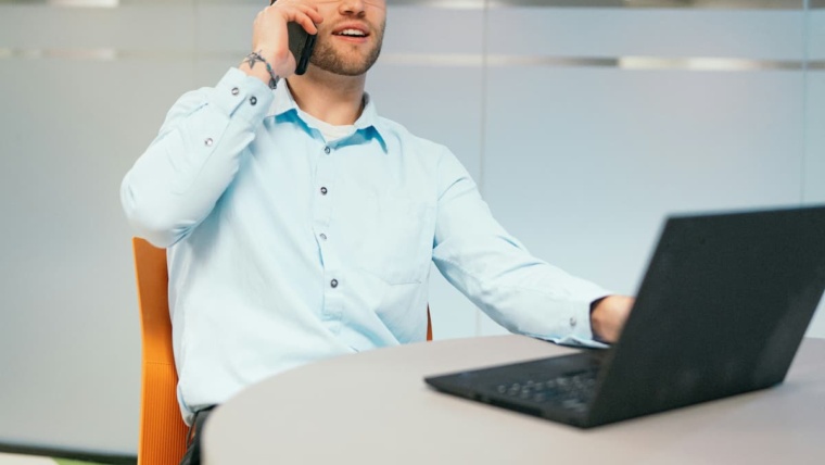 Dallas-Fort Worth business professional managing phone system migration without service interruption