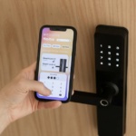 Wireless smart locks Dallas retrofit installed on an office suite door